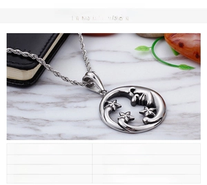 Macro shot of stainless steel moon and star pendant with detailed rope chain and polished finish