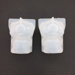 Close-up of translucent 3D pig-shaped silicone molds for DIY resin and plaster crafts