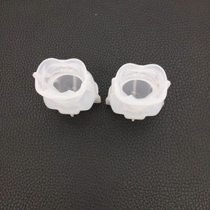 Detail of two semi-transparent 3D silicone pig molds for DIY crystal resin and plaster craft