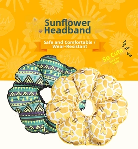 Detail of sunflower pet recovery collar with adjustable drawstring and geometric patterns