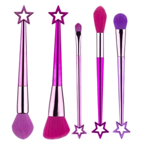 Detail of 5 mermaid makeup brushes with pink-purple gradients and star-shaped handles