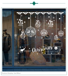 Detailed white Christmas window decals featuring elk silhouettes and festive ornaments
