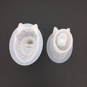 Detail of two wolf head silicone molds for DIY crystal epoxy resin and plaster crafts
