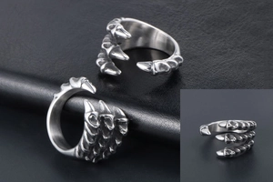 Detailed macro view showing the dragon claw texture and silver finish of the punk steel ring