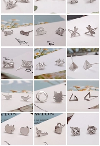 Detailed grid of 925 silver stud earrings in animal, geometric and novelty shapes