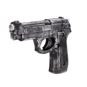 Detailed view of silver-black vintage style toy revolver gun prop for cowboy cosplay