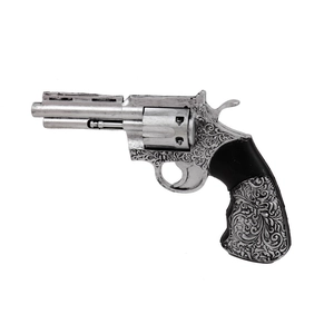 Detail view of silver antique revolver model with intricate floral pattern engravings