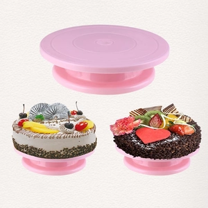 Pink rotating cake turntable with non-slip surface and stable base for professional baking