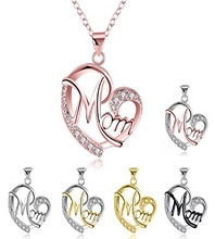 Detailed view of heart-shaped Mom pendant necklaces in five metallic color finishes
