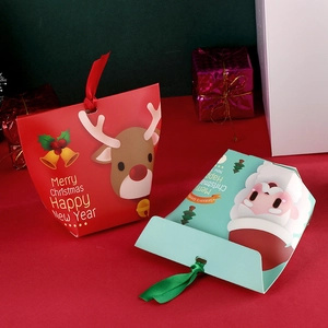 Festive Christmas gift bags with Santa and reindeer designs and elegant ribbon handles