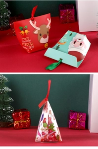 Detailed view of Christmas paper gift bags with ribbons and festive holiday prints