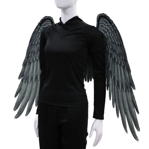 Detailed view of oversized black feather texture on realistic angel wing costume