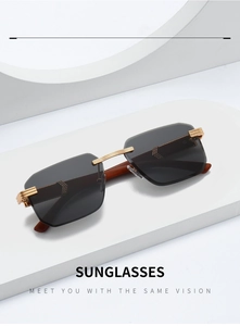 Detailed view of luxury rimless sunglasses with C-shape metal hinge and wood grain temples