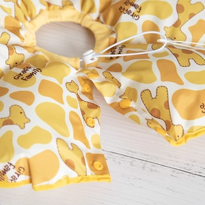 Waterproof sunflower pet cone with yellow giraffe print and adjustable drawstring collar