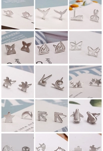 Detailed collection of small silver stud earrings featuring stars, moon and animal shapes