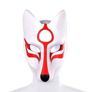 Front view detail of a white Japanese Kitsune mask with red facial patterns for cosplay