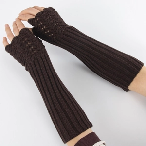 Close-up of long dark brown knitted fingerless gloves showing elastic texture on hands