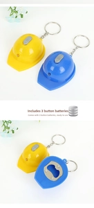 Detail view of helmet keychain with LED light, bottle opener, and pre-installed batteries