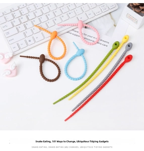 Colorful flexible silicone cable ties in snake shape for organized cable management.