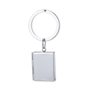 Polished silver stainless steel book-shaped locket keychain detail on white background