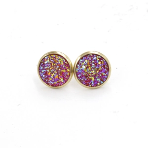 Close-up of 12mm gold-plated stud earrings with colorful iridescent resin inlay details