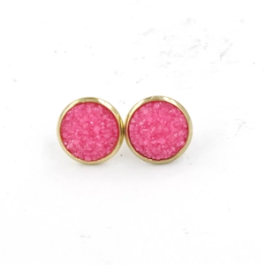 Detail of 12mm gold stainless steel stud earrings with rose pink resin druzy texture