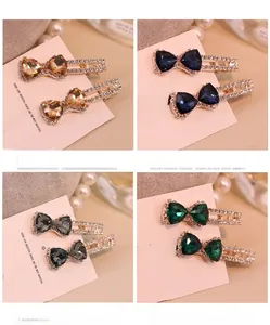 Détail de quatre couleurs de barrettes à cheveux nœud en strass pour femmes