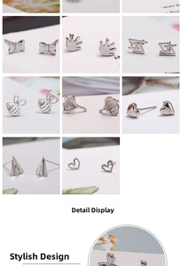 Macro detail of various silver stud earring designs including bow, bee and heart shapes