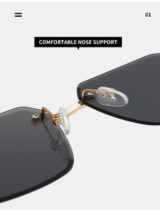 Detailed macro view of comfortable nose pads and gold metal bridge of square sunglasses