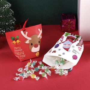 Christmas gift boxes with Santa and Reindeer designs for holiday sweets and cookies