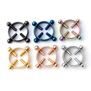 Set of six colorful non-piercing adjustable stainless steel nipple rings in macro view
