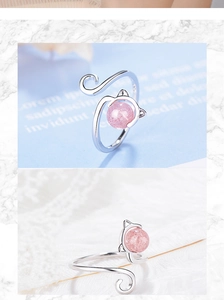 Close-up of pink strawberry crystal cat ring with S925 silver adjustable band details