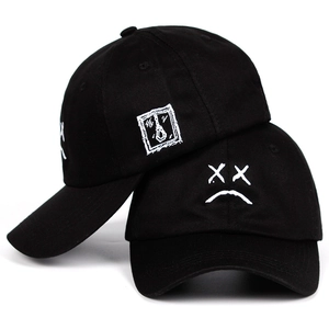 Black twill cotton baseball caps featuring white sad boy embroidery and artistic patterns