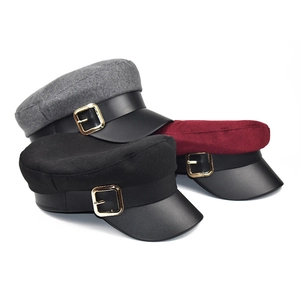 Wool newsboy cap with black leather brim and golden buckle in three assorted colors