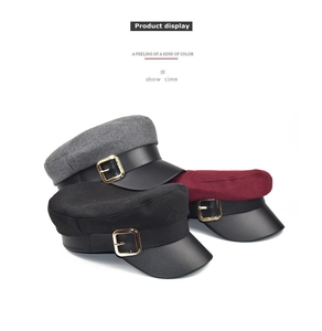 Woolen newsboy caps in black, grey and burgundy with PU leather brims and metal buckles