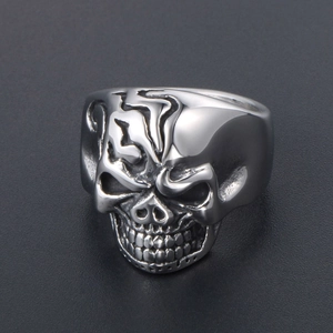 Men's bold skull ring in silver-tone metal with intricate facial bone carvings