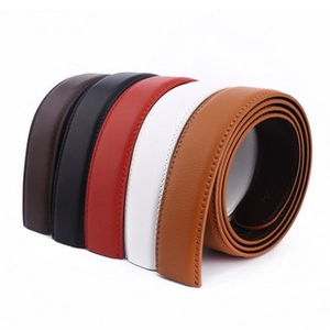 Detail of five colored leather belts showing fine litchi texture and neat stitching