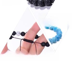 Detail of adjustable braided rope and volcanic lava stone beads for energy bracelet