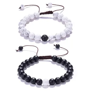 Detailed view of adjustable lava stone and white turquoise beaded bracelets for couples