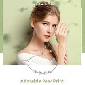 Detail showing S925 sterling silver chain with cat paw pendants and adjustable slider