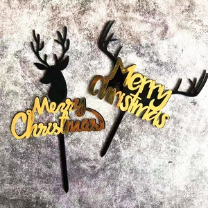 Black reindeer head acrylic cake topper with golden Merry Christmas text for party decor