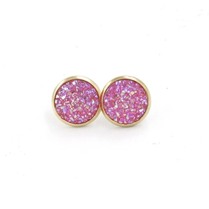 Macro detail of 12mm gold plated stud earrings with sparkly pink resin druzy inlay