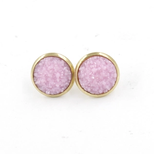 Detail view of 12mm pink druzy earrings with polished gold plated stainless steel edges