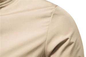 Detailed stitching on the shoulder and stand-up collar of khaki casual men jacket