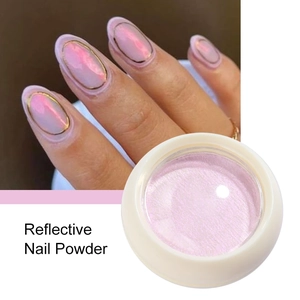Macro detail of reflective purple nail powder in a beige jar with applied gold trim manicure
