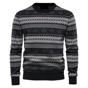 Detailed view of the crew neck collar and Nordic geometric knit pattern on a men's sweater