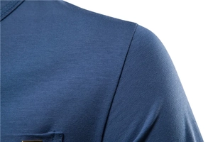 Detail of dark blue knit t-shirt showing shoulder stitching and fabric texture