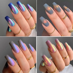 Detail showing four holographic aurora nail powder effects on rectangular long nails