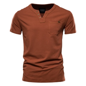 Detail of rust-red Henley T-shirt featuring V-neckline with three buttons and chest pocket