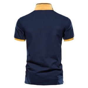 Detail view of the navy blue cotton Polo shirt back with yellow contrast collar and cuffs